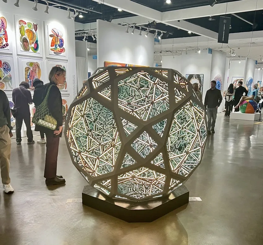 Illuminated geometric artwork on display