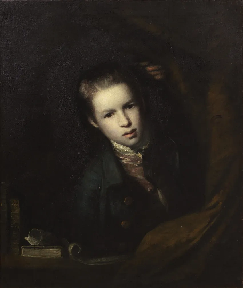 Portrait of a young person in darkness