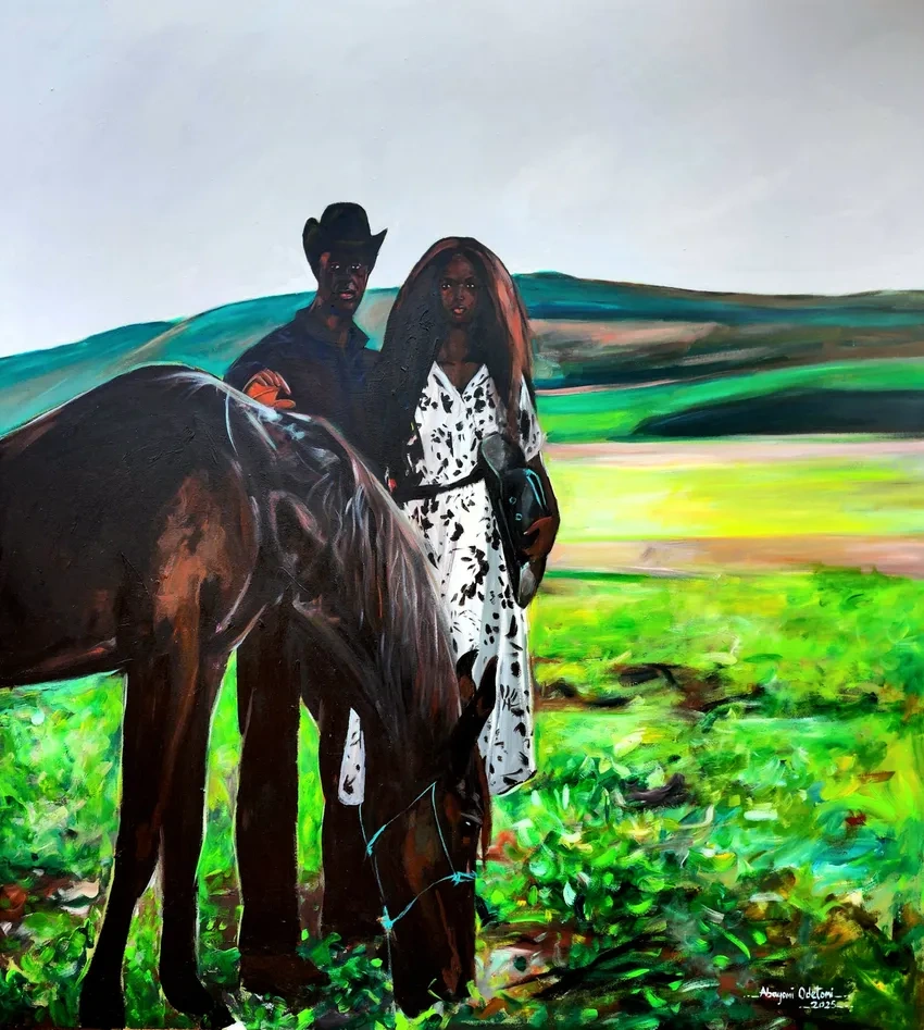 Cowboy and woman with horse in field