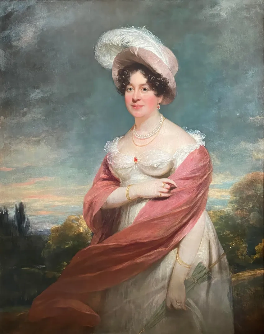 Portrait of woman in pink and white attire