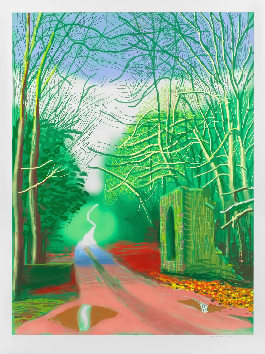 Colorful forest path with vibrant trees.