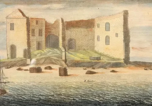 Historic coastal castle with sailing ships
