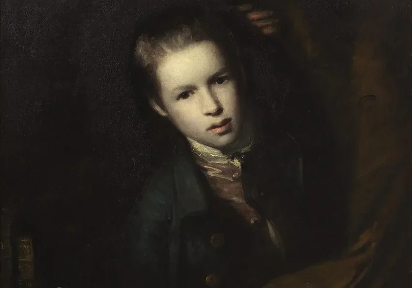 Portrait of a young person in darkness