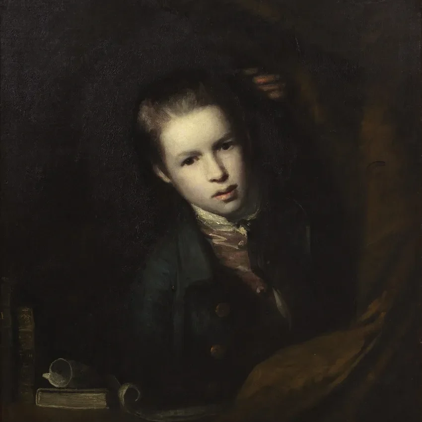 Portrait of a young person in darkness
