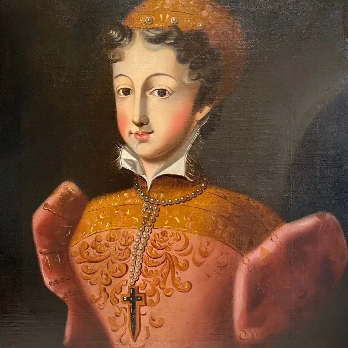 Portrait of a historical figure in ornate dress.