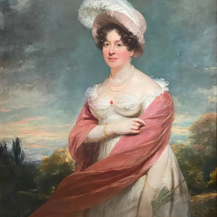 Portrait of woman in pink and white attire