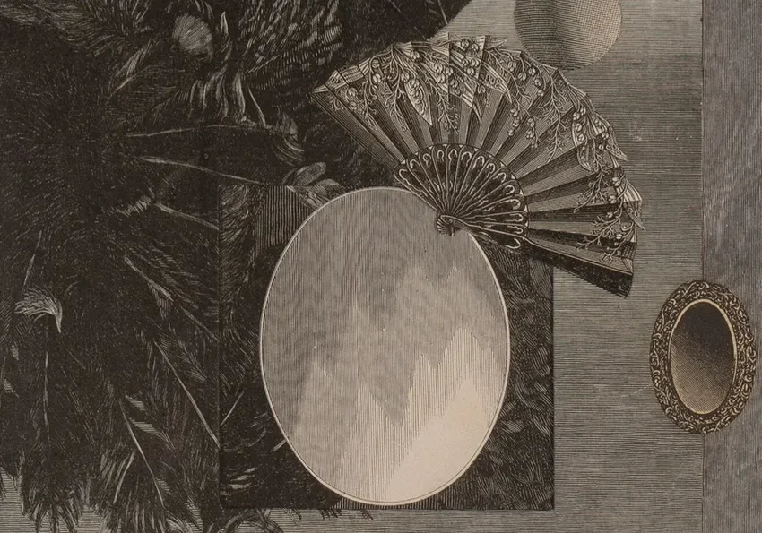 Vintage fan and oval mirrors display