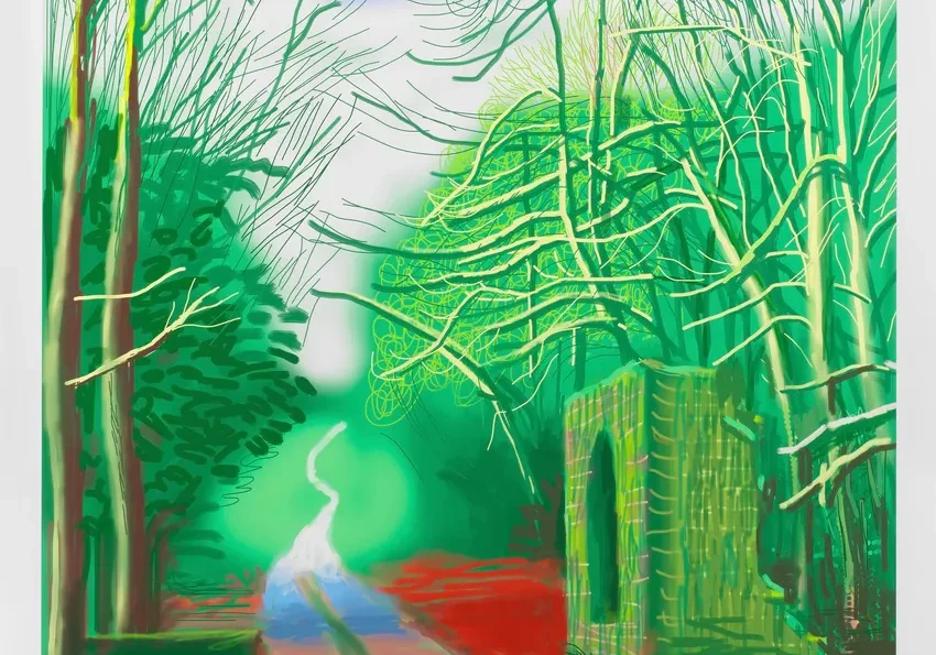 Colorful forest path with vibrant trees.