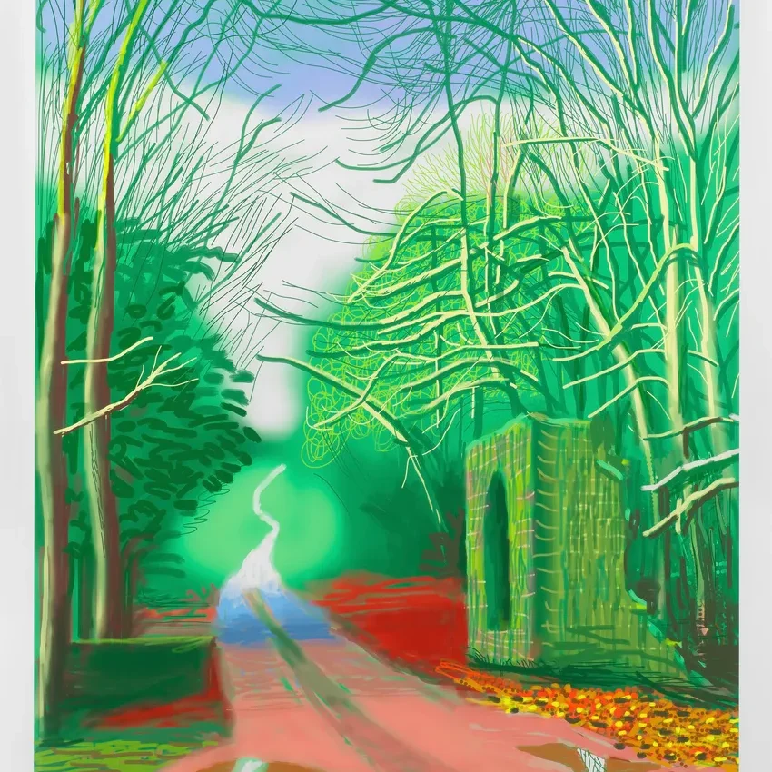 Colorful forest path with vibrant trees.